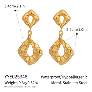 Detail showing dimensions and waterproof features of gold hammered stainless steel earrings