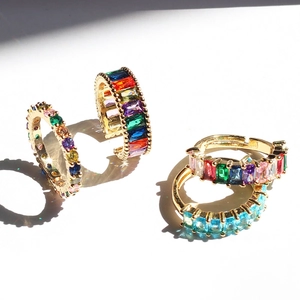 Colorful rainbow zirconia ring and earring set in gold plating with natural sunlight