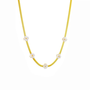 Minimalist gold herringbone chain necklace featuring white shell floral charms for women