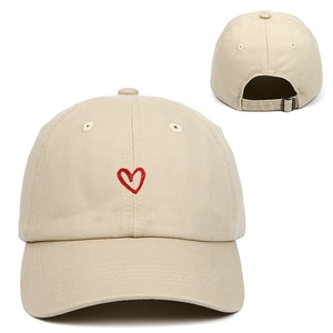 Unisex beige cotton baseball cap featuring a red heart embroidery and adjustable metal buckle