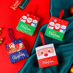 Christmas drawer gift boxes with cartoon illustrations and silk ribbons in holiday colors