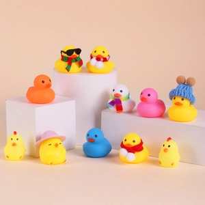 Christmas Advent Calendar set with 10 colorful rubber ducks and chicks in winter outfits