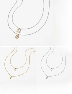 Macro view of double layer stainless steel necklaces with PVD gold and silver plating