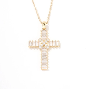 Elegant gold cross necklace for women featuring sparkling cubic zirconia on a white background