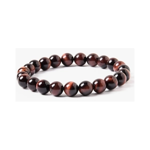 Macro detail of 8mm red tiger eye stone beaded bracelet showing natural brown stripes