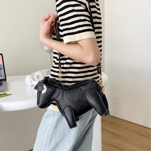 Creative black horse-shaped crossbody bag with gold chain strap and tassel charm