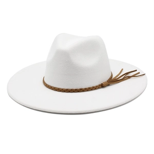 White wool felt wide brim jazz hat with brown braided leather belt and fringe detail