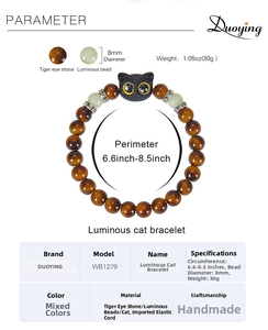 Detailed view of handmade cat charm bracelet with tiger eye beads and luminous stone