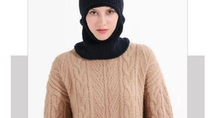 Detail of black knitted balaclava with warm fleece lining and windproof ear protection