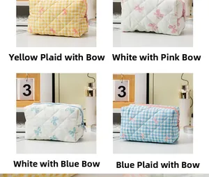 Quilted cotton cosmetic bags with bow prints and secure zipper in four colorful styles