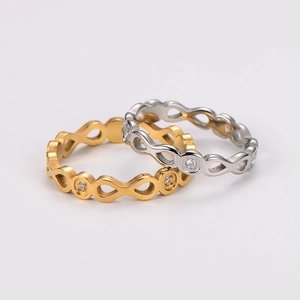 Infinity wave ring in gold and silver finish with sparkling crystal embellishments