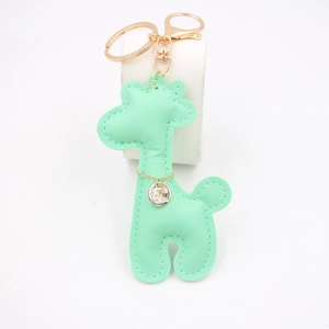 Mint green leather giraffe keychain with gold metal clasp and Love Life round charm