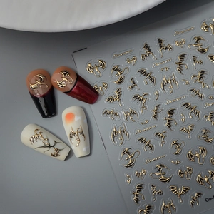3D embossed demon wing nail stickers with gold and black totem patterns for DIY manicure