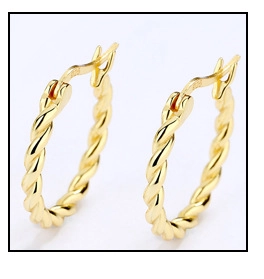 Close-up of 925 hallmark on 18k gold plated twisted hoop earrings with s925 stamp
