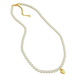 Elegant white pearl necklace with gold heart pendant on a clean white background