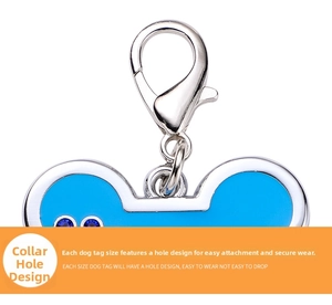 Macro view of blue bone-shaped pet tag with zinc alloy lobster clasp and blue zircon detail