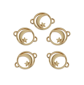 Five gold moon and star metal frame charms for DIY jewelry making on white background