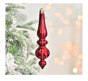 Close-up of red electroplated teardrop Christmas ball hanging on a snowy tree branch