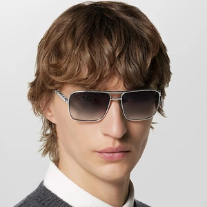 Detail of silver navigator sunglasses with Damier pattern on temples and gradient lenses