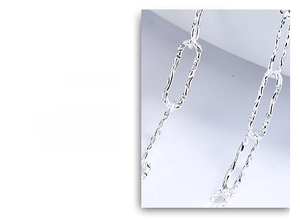 Detailed macro view showing the textured rectangular links and artisanal craftsmanship of the 925 silver chain