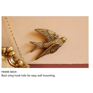 Golden swallow metal wall decor with vintage embossed feather texture and hanging hook