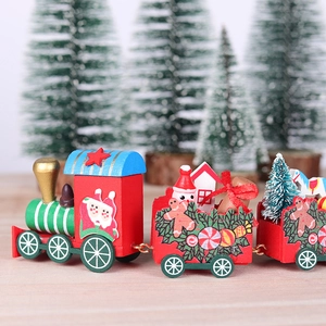 Close-up of wooden Christmas train detail with gingerbread man and festive painted textures