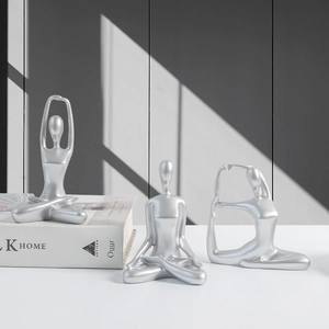 Three-piece set of silver minimalist yoga figures for modern home desk and shelf decor