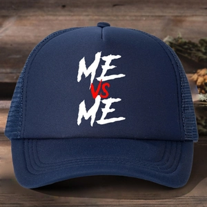 Detail of navy blue trucker hat with ME VS ME print on mesh and curved brim design