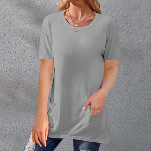 Detail view of the functional side pockets and round neckline on a grey casual T-shirt