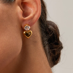 Minimalist 18k gold plated heart drop earrings with sparkling zircon stars on model