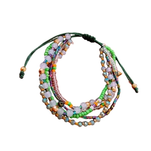 Bohemian multi-layer beaded bracelet with green crystals and adjustable cord closure