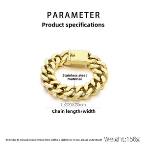 Macro view of 20mm gold stainless steel Cuban link bracelet with square safety clasp