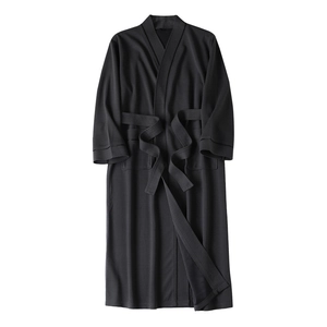Unisex charcoal grey waffle knit bathrobe with long sleeves and belted waist design