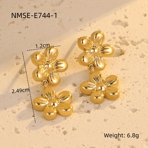 Detailed view of gold flower tassel earrings with size measurements and weight specs