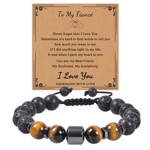 Detail of 10mm lava and tiger eye stone bracelet on a sentimental To My Fiancé gift card