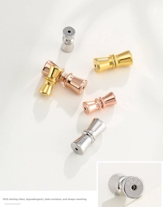 Macro detail of S925 sterling silver jewelry clasps in gold silver and rose gold
