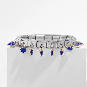 Detail of stainless steel modular bracelet with blue heart charms and rose gold accents