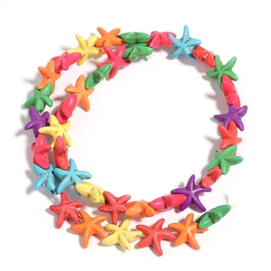 Colorful starfish-shaped turquoise loose beads arranged in a circular ring pattern