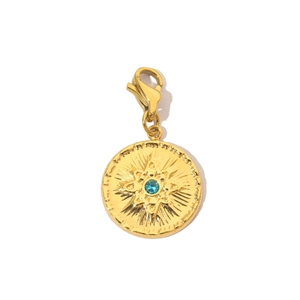 Detail of golden stainless steel evil eye pendant with blue crystal and lobster clasp
