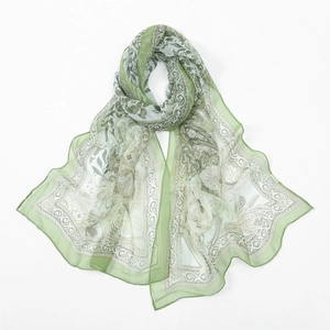 Lightweight green silk scarf with paisley and floral prints for sun protection