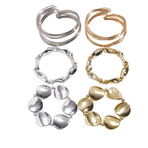 Three-piece set of geometric twisted round double-layer open bracelets in gold and silver