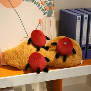 Cute funny peanut plush toy with three red beans on a cozy yellow base for home decor