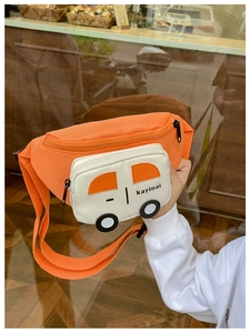 Detailed view of kids cartoon car fanny pack in bright orange nylon with dual zippers