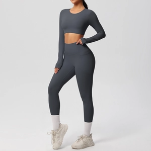 Detail of high waist yoga leggings with functional side pocket in charcoal gray