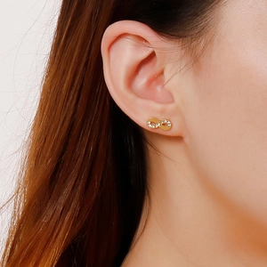 Elegant gold infinity symbol stud earrings with sparkling white cubic zirconia accents