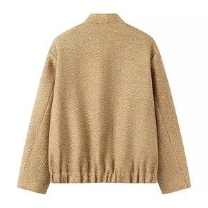 Flat lay back view of gold tweed jacket showing textured knit fabric and silhouette