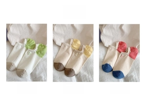 Three pairs of cotton ankle socks with colorful heel blocks and smiley face embroidery