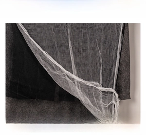 Close-up of fine white gauze mesh fabric for Halloween spooky ghost scene decorations