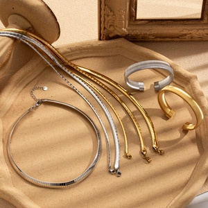 Minimalist gold and silver stainless steel flat snake chain necklaces and bracelets