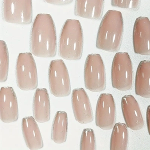 Short coffin press-on nails in jelly pink with silver glitter French tips for women